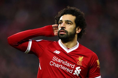 LIVERPOOL, ENGLAND - FEBRUARY 04: Mohamed Salah of Liverpool celebrates after scoring his sides first goal during the Premier League match between Liverpool and Tottenham Hotspur at Anfield on February 4, 2018 in Liverpool, England. (Photo by Clive Brunskill/Getty Images)