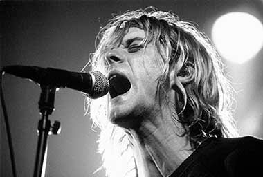 AMSTERDAM, NETHERLANDS - NOVEMBER 25: Kurt Cobain from Nirvana performs live on stage at Paradiso in Amsterdam, Netherlands on November 25 1991 (photo by Frans Schellekens/Redferns)
